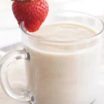 Delicious Oladi Pancakes with Fresh Berries and Creamy Sour Cream