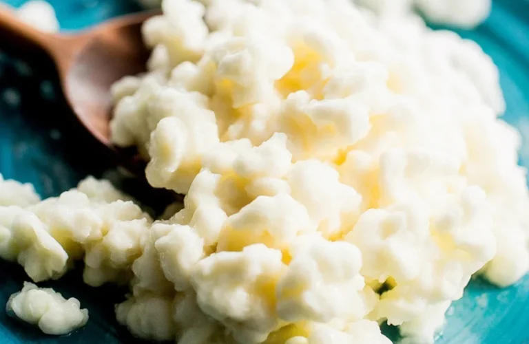 A glass of kefir, a fermented milk drink rich in probiotics and nutrients.