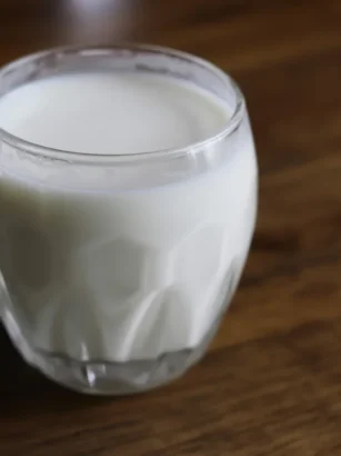 Glass of kefir drink made from grains originating from the Caucasus mountains.