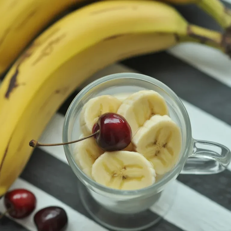 Kefir Banana Smoothie with frozen berries and peanut butter in a glass