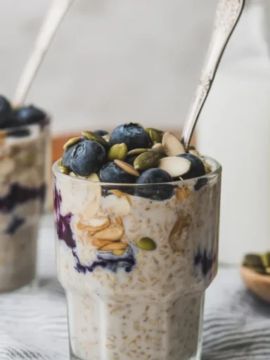 Bowl of Kefir Overnight Oats topped with fresh fruit and chia seeds