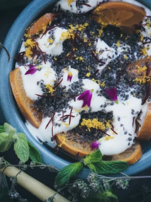 Kefir Saffron Lemon Chia Pudding served in a bowl with fresh fruit garnish