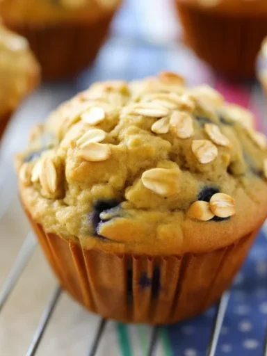 Delicious Yogurt Kefir Breakfast Muffins topped with fresh berries.