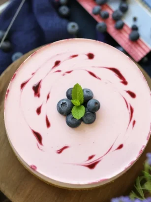 Delicious Yogurt-Kefir Cheesecake topped with fresh blueberries.