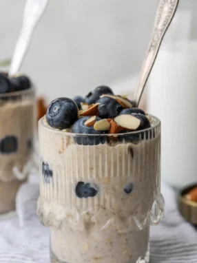 Bowl of Yogurt Kefir Overnight Muesli topped with fresh fruit and nuts