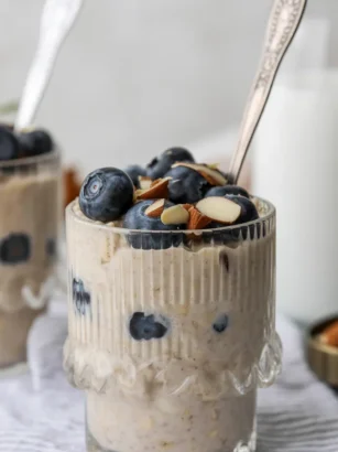 Bowl of Yogurt Kefir Overnight Muesli topped with fresh fruit and nuts